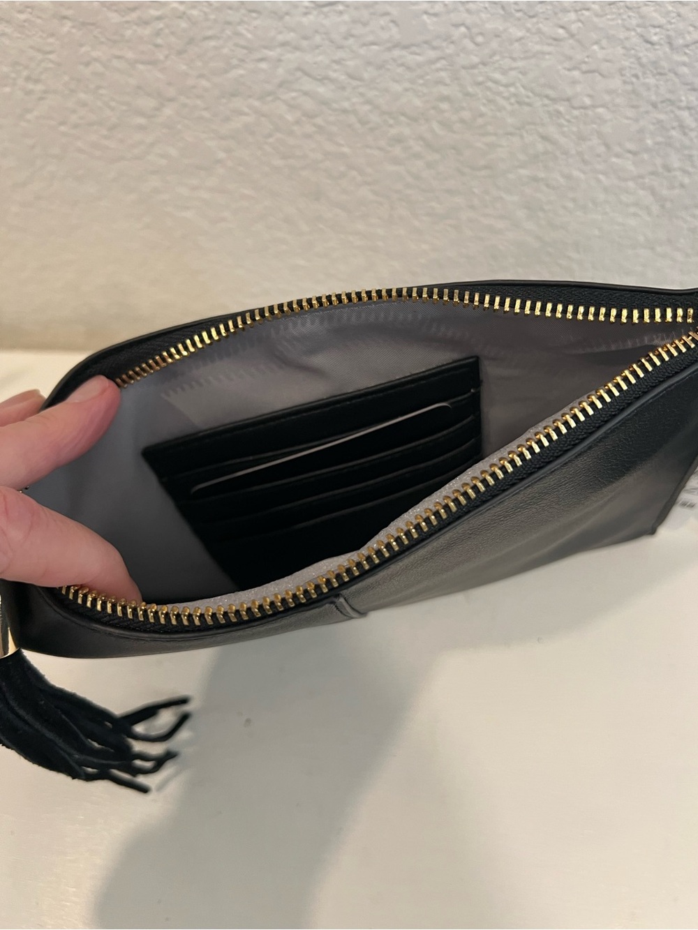 INC International Concepts Black Wristlet Clutch with Tassel Accent - Picture 2 of 3